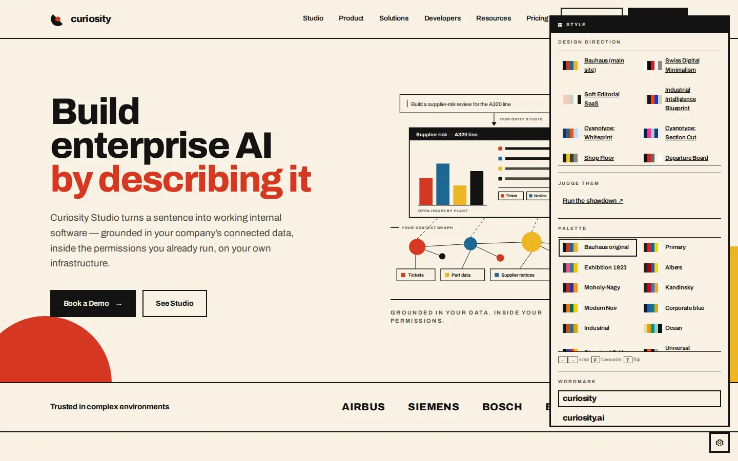 The staging cog: design directions, twenty-eight palettes, three wordmarks and a grain toggle, on every page of the real site.